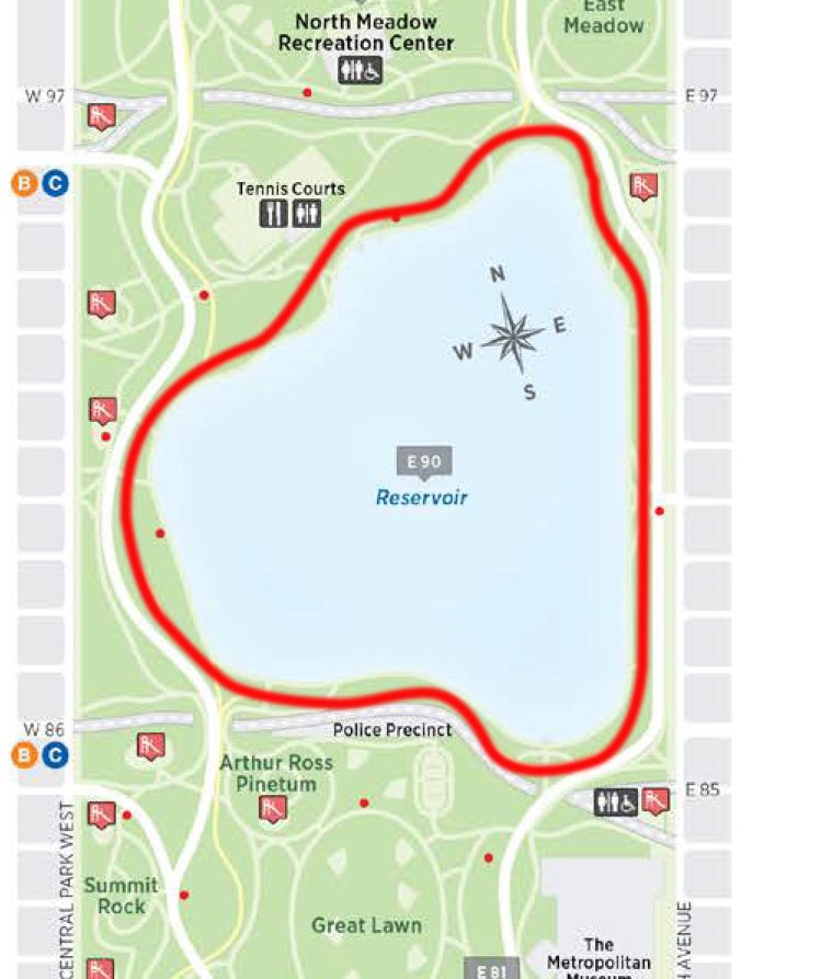 Runners on the 1.58-mile Central Park Reservoir track with the Manhattan skyline