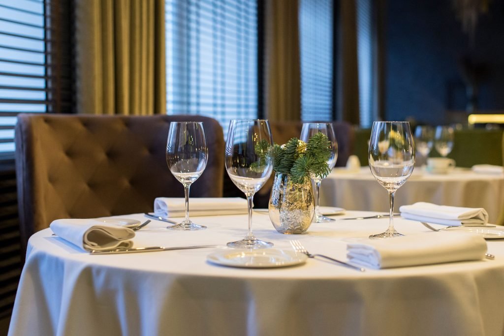 Elegant fine dining restaurant table setting in New York City at night