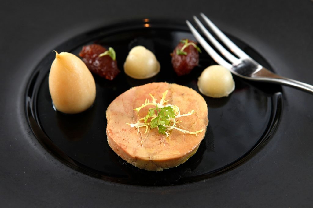 Michelin star tasting menu plate at a fine dining restaurant