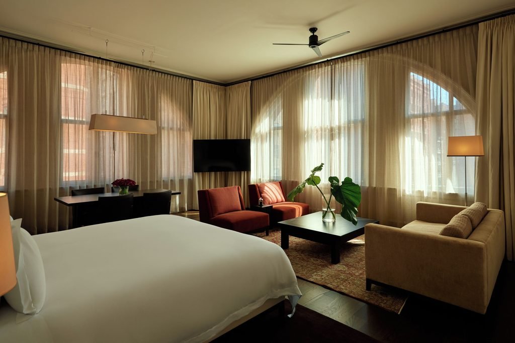 Loft-style guest room at The Mercer Hotel in SoHo near the parade route